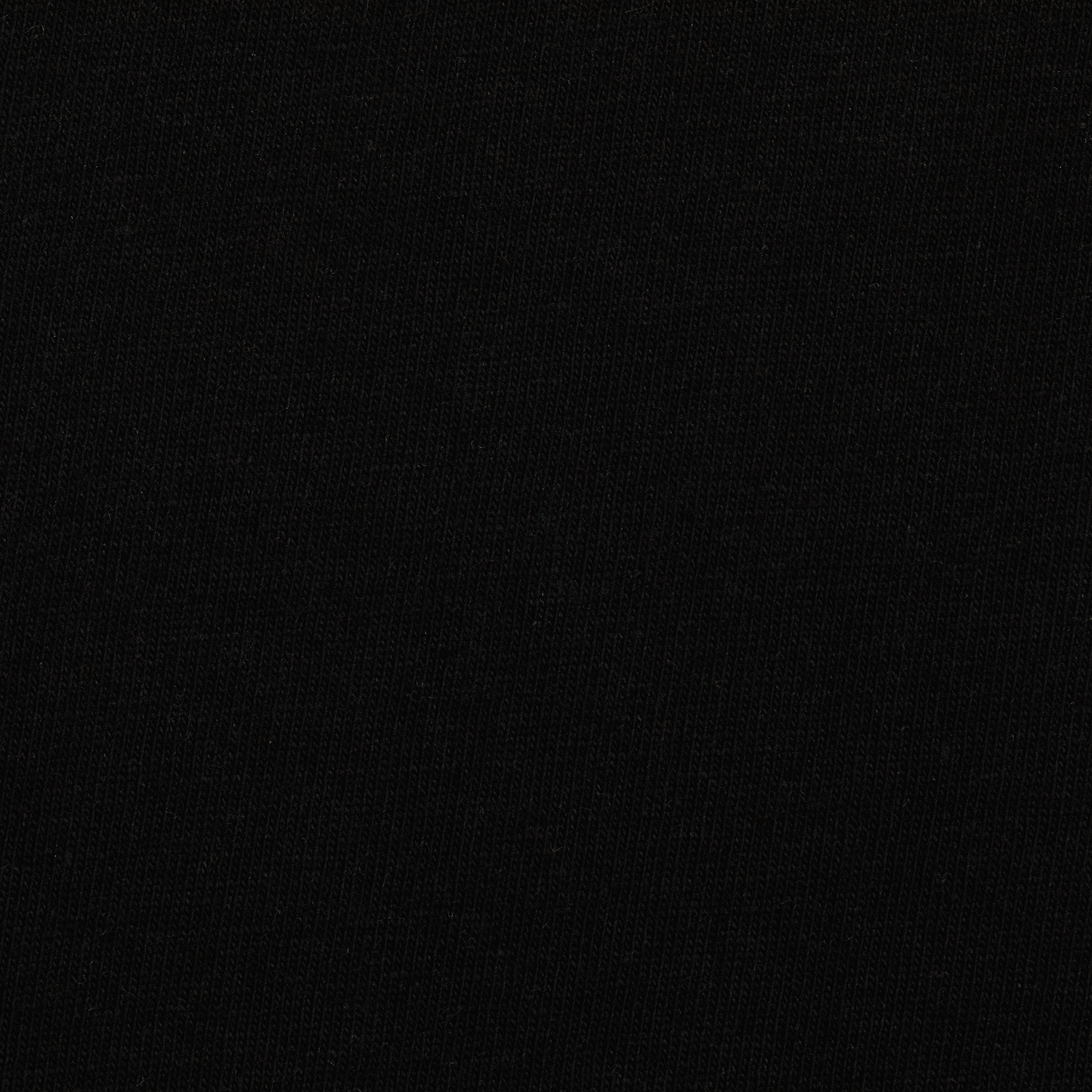 Swatch view of a black tee with refined embroidery detail on the sleeve and screen-printed details on the front and back, this tee delivers a balance of comfort, structure, and everyday wearability.