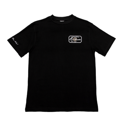 Front  view of a black tee with refined embroidery detail on the sleeve and screen-printed details on the front and back, this tee delivers a balance of comfort, structure, and everyday wearability.