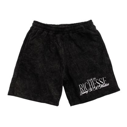 Front view of a acid wash elevated silhouette sweatshorts features refined embroidery and screen-printed details on the front, delivering comfort, structure, and edge in equal measure.