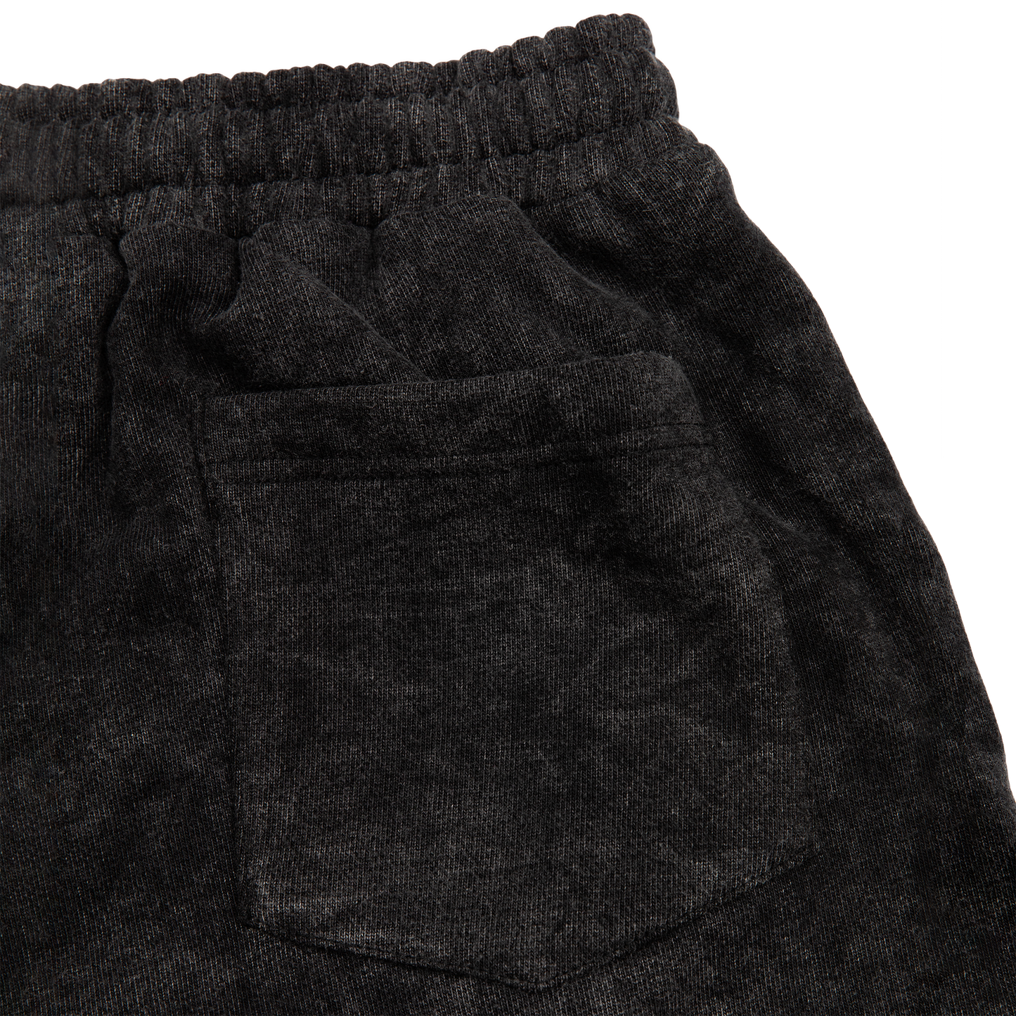 Back pocket view of a acid wash elevated silhouette sweatshorts features refined embroidery and screen-printed details on the front, delivering comfort, structure, and edge in equal measure.
