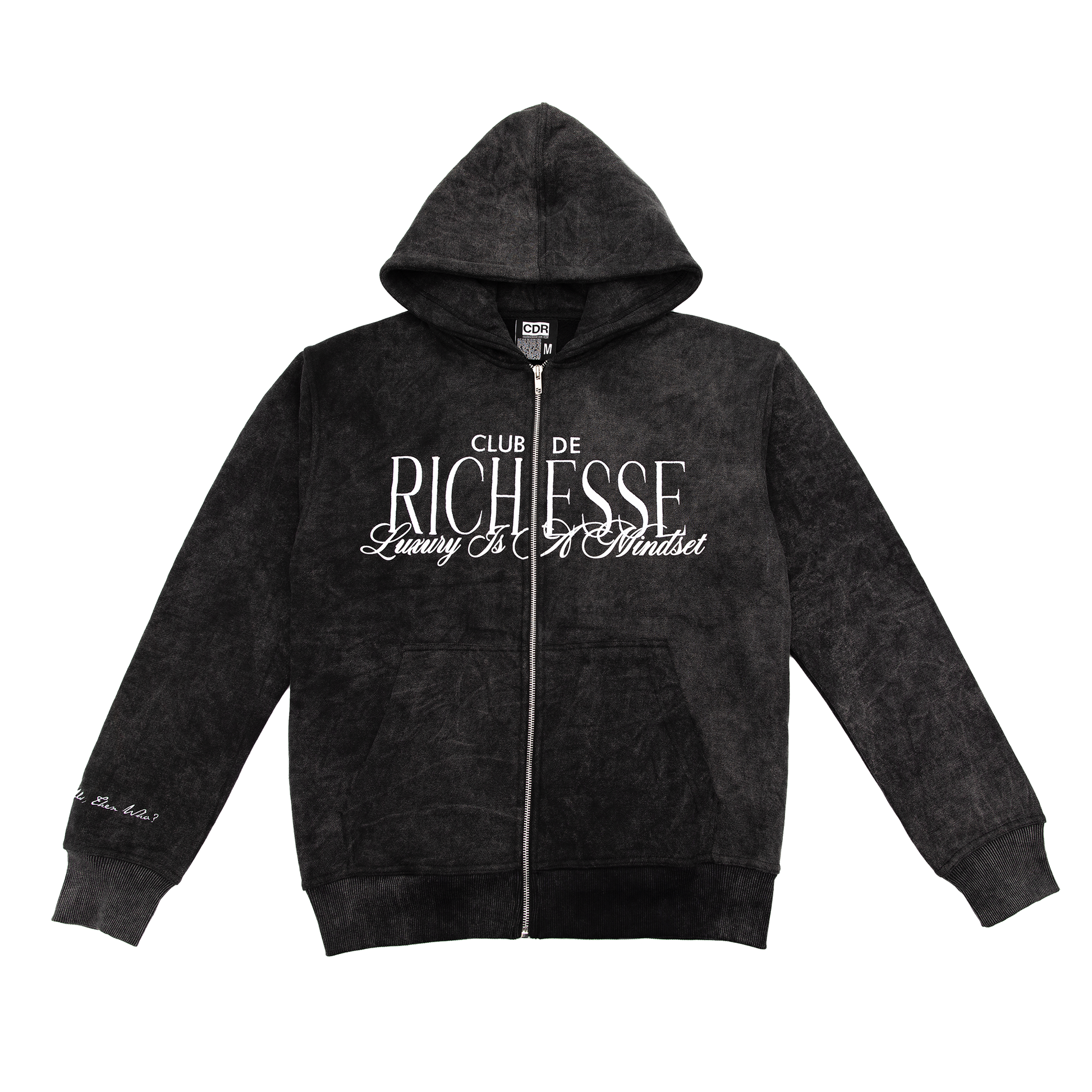 Front view of an acid wash full-zip silhouette features elevated embroidery and screen-printed details on the front, balancing structure, comfort, and edge.
