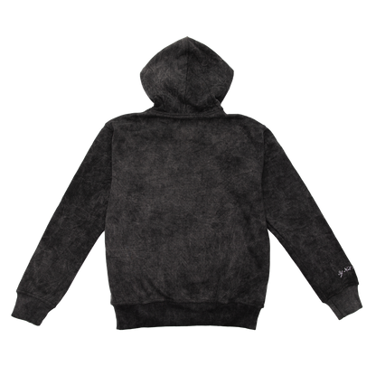 Back view of an acid wash full-zip silhouette features elevated embroidery and screen-printed details on the front, balancing structure, comfort, and edge.
