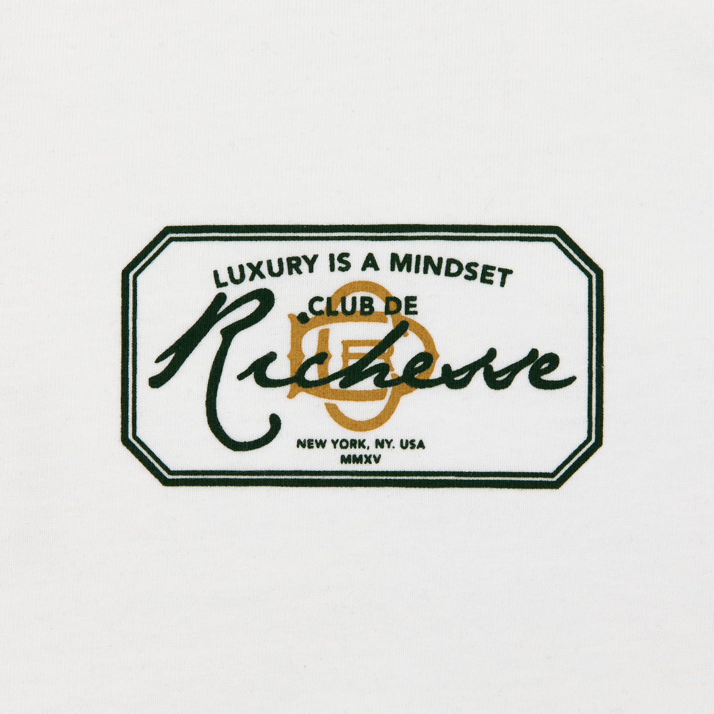 Chest close up  view of a white tee with refined embroidery detail on the sleeve and screen-printed details on the front and back, this tee delivers a balance of comfort, structure, and everyday wearability.